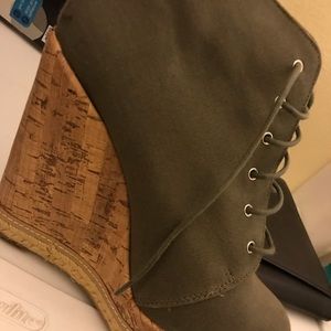 Olive green high heels with cushioning comfort.